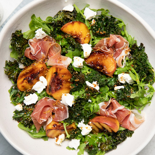 Grilled peach and prosciutto salad